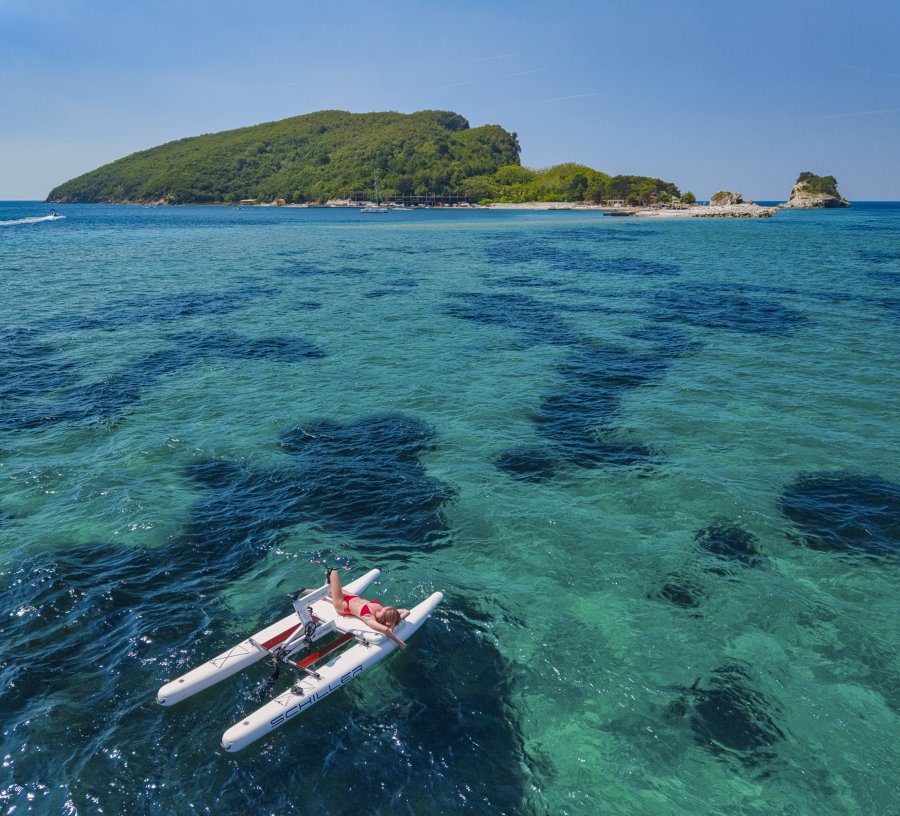 Aquaride waterbike on open turquoise water from above